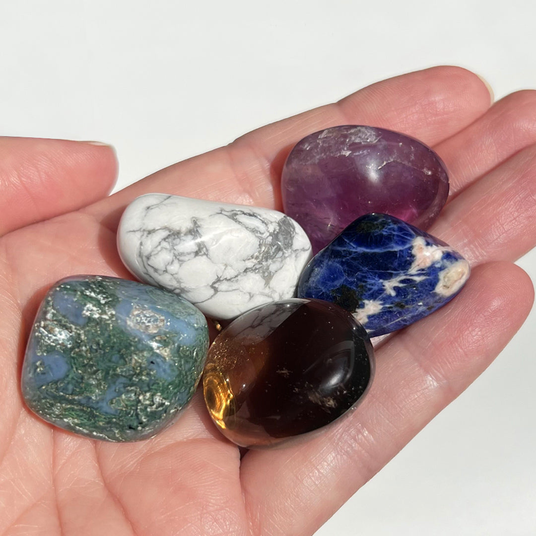 A carefully curated crystal kit, containing five crystals that work together to support your intension